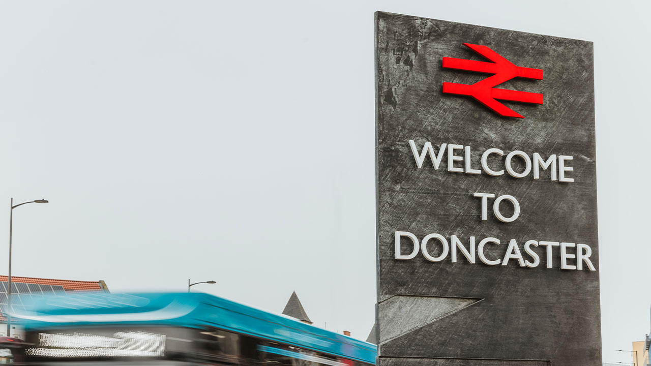 Welcome to Doncaster rail station sign
