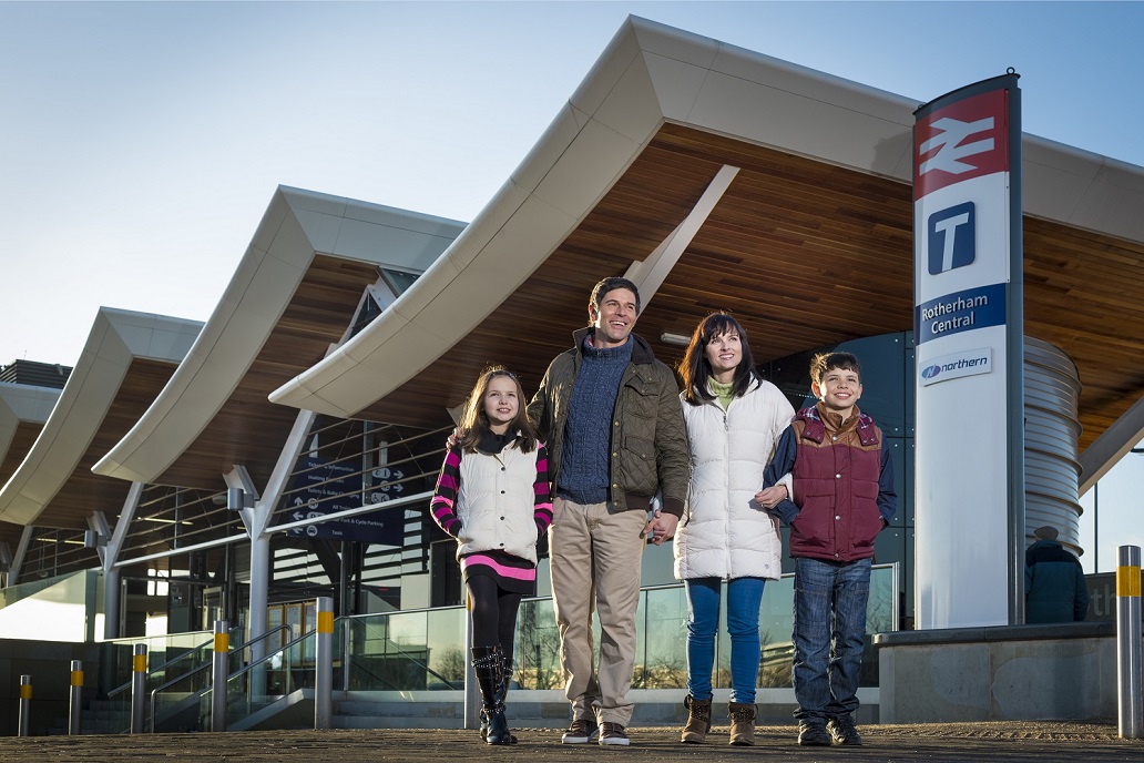 Family outside Rotherham Central train station