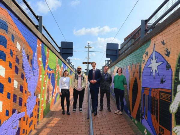 Pictured left to right: Jasmine Thompson, Senior Marketing Manager at Supertram, Alastair Flindall, Director at Lick of Paint Festival, Councillor Tom Hunt at Sheffield City Council, Neill Barraclough, Deputy Head of Engineering at Supertram, Councillor Laura McClean at Sheffield City Council.