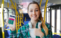 Student on bus with phone