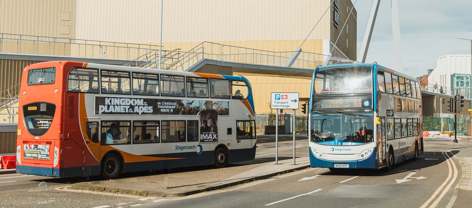 Two buses on the road