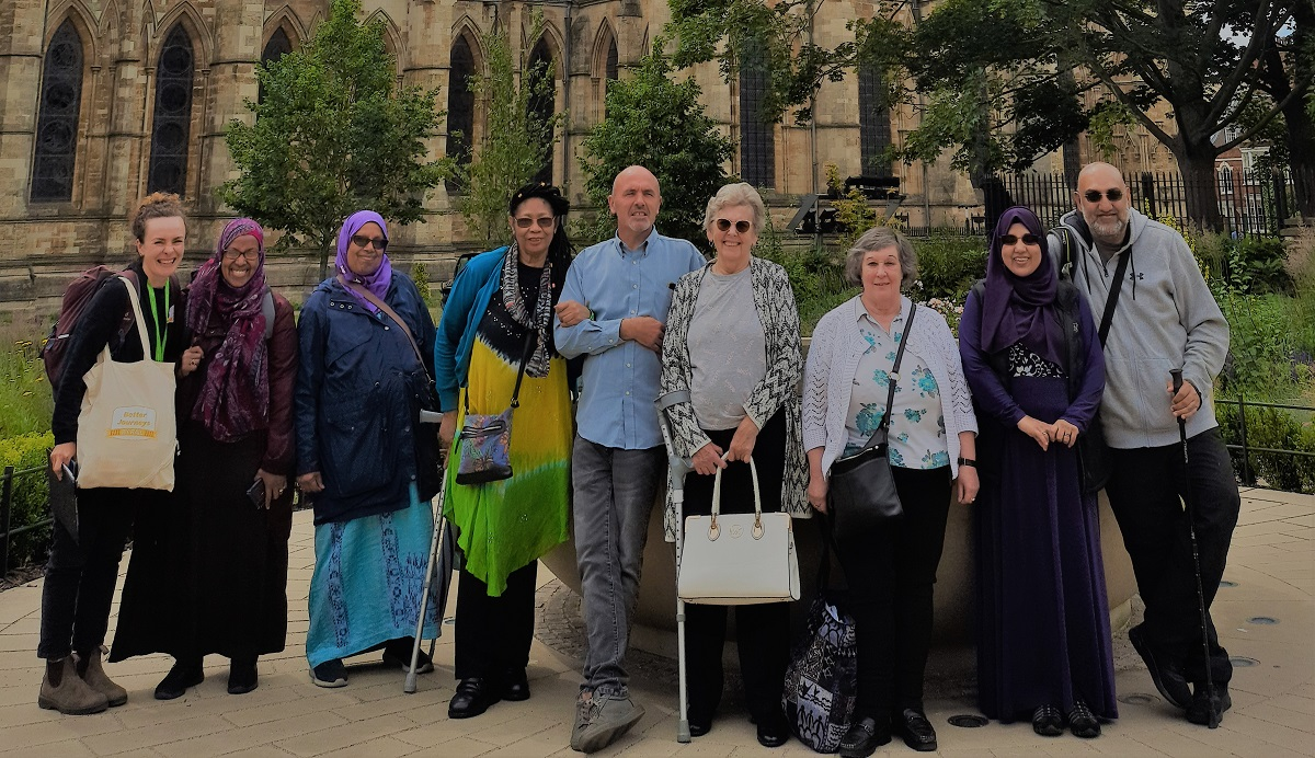 Lincoln rail trip group close up in front of Lincoln cathedral