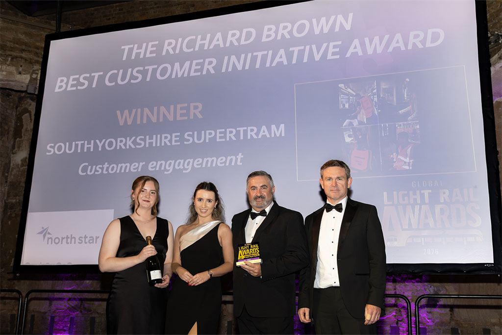 Supertram customer service team holding award