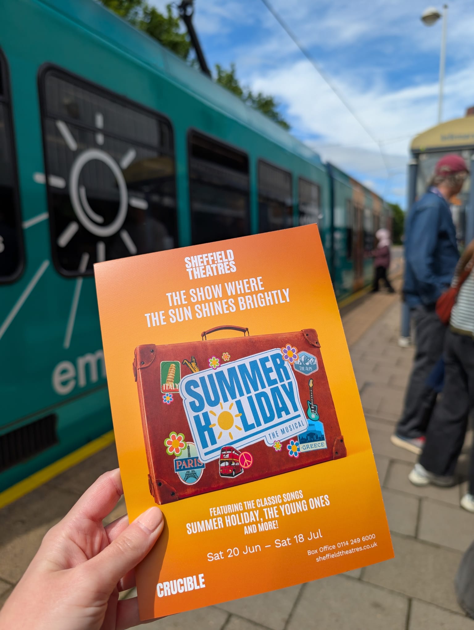 programme held up, tram behind