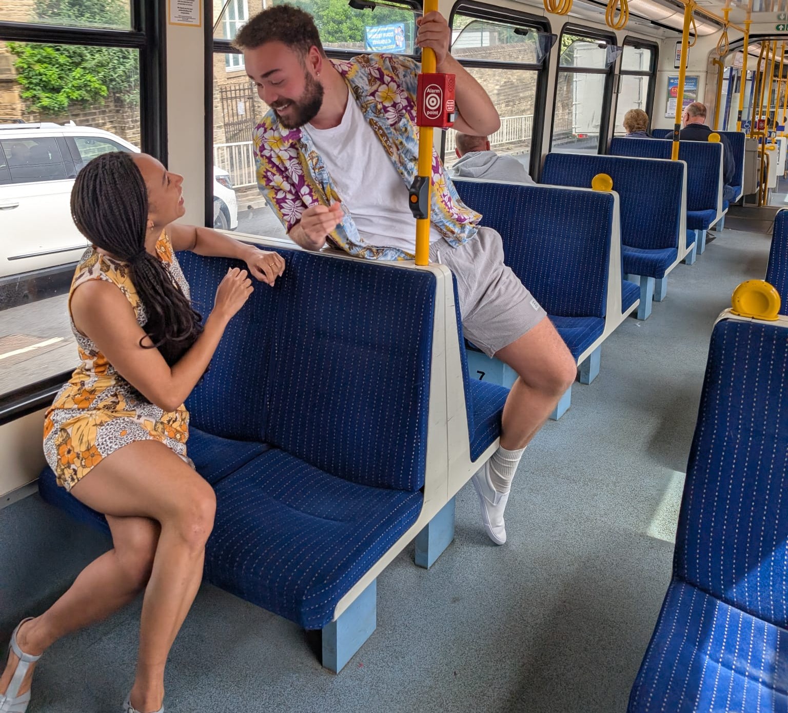 on the tram, chatting