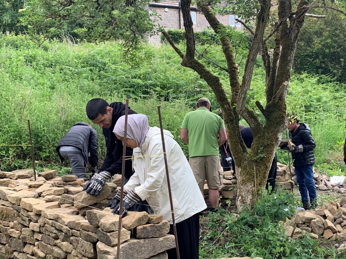 People building a wall