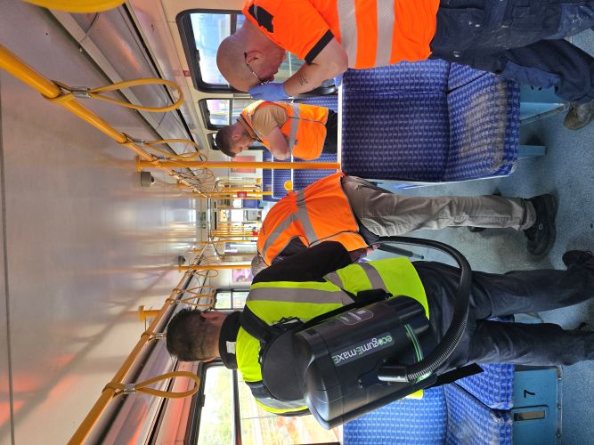 An initial demo trial of the chewing gum removal machine on another tram