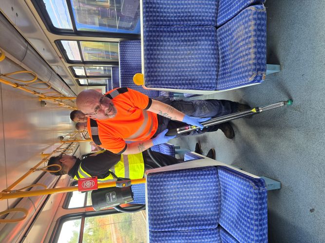 An initial demo trial of the chewing gum removal machine on another tram