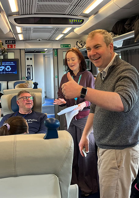 young people and the volunteers on the train